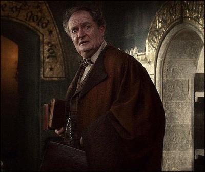 What does Proffesor Slughorn disguise himself as when Dumbledore and Harry visit him in Budleigh Babberton?