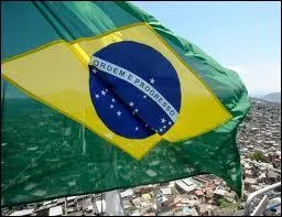 On this flag, we see a blue sphere on a yellow diamond on a green background. It flies on ------------.