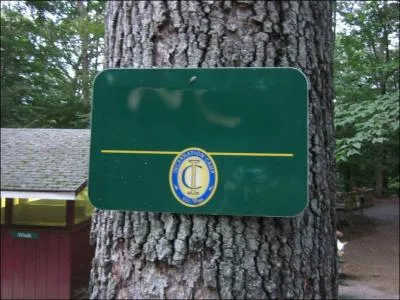 In front of what unit on camp can you find this sign?