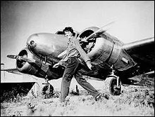 Was Amelia Earhart flying solo on her trip around the world?