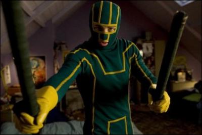 What superhero name does this high school student, hero of the eponymous movie released in 2010, who decided to put on a green and yellow costume to defend the widow and the orphan, have?