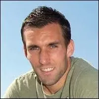 In which foreign club did Anthony Reveillère evolve in 2003 ?