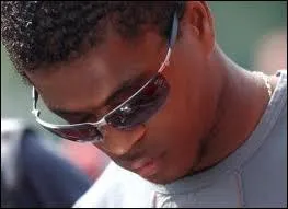 Under which club's jersey did Patrice Evra play his first match in L2 in 2000 ?