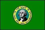 The WA State flag is similar to the state seal with a picture of ______________ in a _________ color bunting and the year 1889.