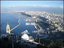 Where does the action take place in Albert Camus's novel The Plague?