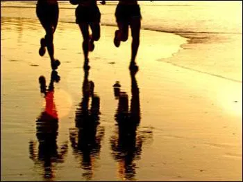 It was early in the morning. The only people jogging on the beach were my brothers and ... .