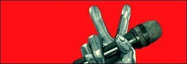 Two fingers shouting victory while holding a microphone, that's the logo of :