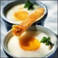 Crack an egg into a greased ramekin. Preheat the oven (120) and bake in a bain-marie until the yolk begins to thicken. You get a ... egg (also known as baked egg).