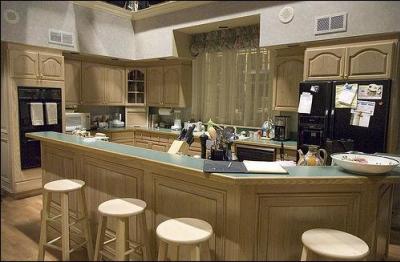 Which family gathers in this kitchen?