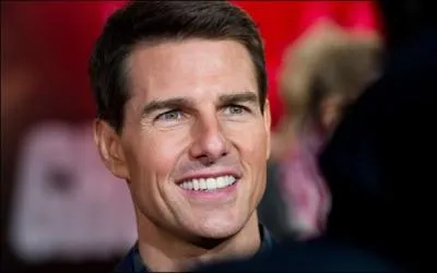 What disability does Tom Cruise have?