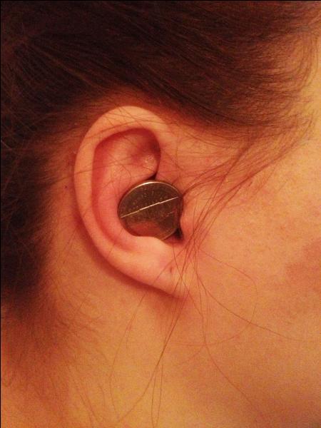 Coins are not allowed to be placed in one's ears.