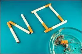 I was very pleased ____ him for giving up smoking