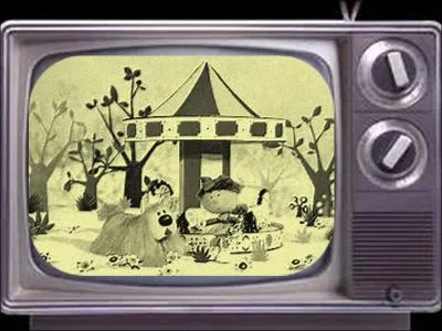 What was the name of the dog in the show Le manege enchante ?