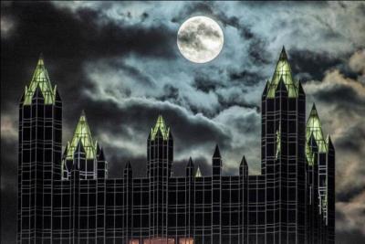 This beautiful photo of a harvest moon was taken by Dave DiCello in Pittsburgh. What building is it?
