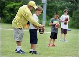 Which legendary NFL quarterback's father was also a legendary quarterback from Mississippi, is currently ranked in the top 3 in the country and is on par to surpass the standings of Brett Favre, NFL's #1 overall quarter back and Steve Mcnair who was one of NFL's top 5 quarter backs of all time, both of which are also from Mississippi?