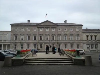 Politics. The National Irish Parliament sits in Leinster House, Dublin.