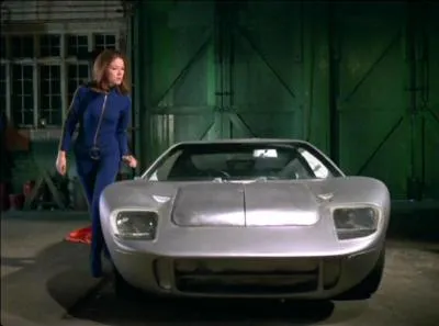 This beautiful lady drove this sleek speedster, on which British series did she display her curves and drive on soft shoulders?