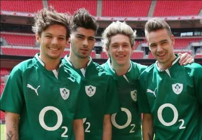 Who're two members of One Direction who have the same middle name?