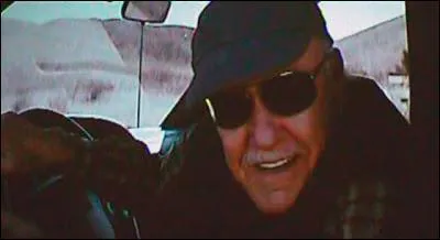 Stan Lee pulls Thor's hammer with his truck.