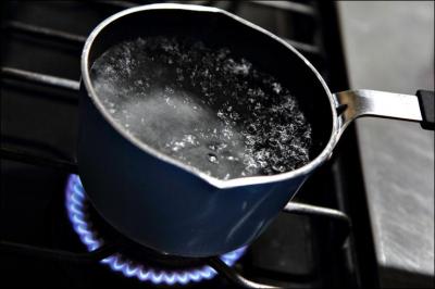 If water (reach) 100 degrees, it (boil)