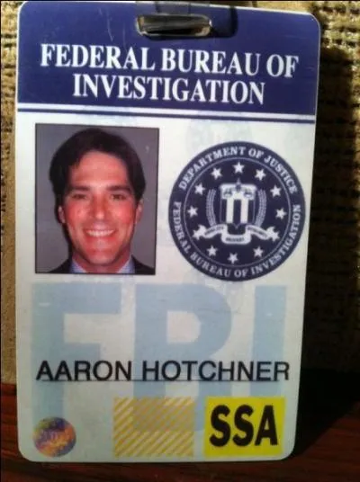 In season 2, who is hired by Strauss to help her to transfer Hotch?