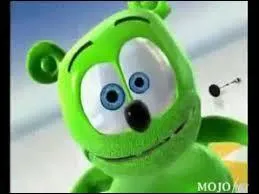 What's the name of the green singing bear in the photo?