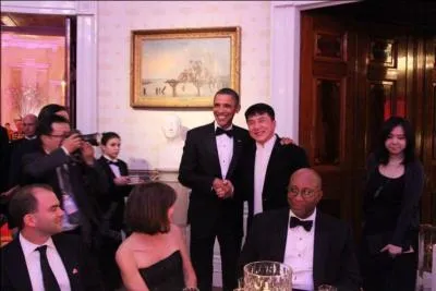 In 2011 Jackie was invited to dinner at the White House. A momentous occasion for any one. However Jackie's manager had to insist Jackie leave something in the car. What was it?