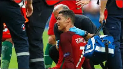 During the Euro 2016 final, which player injured Ronaldo's knee?